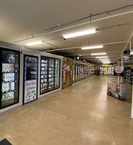 the inside of a grocery store with a sign that says buy good enhance