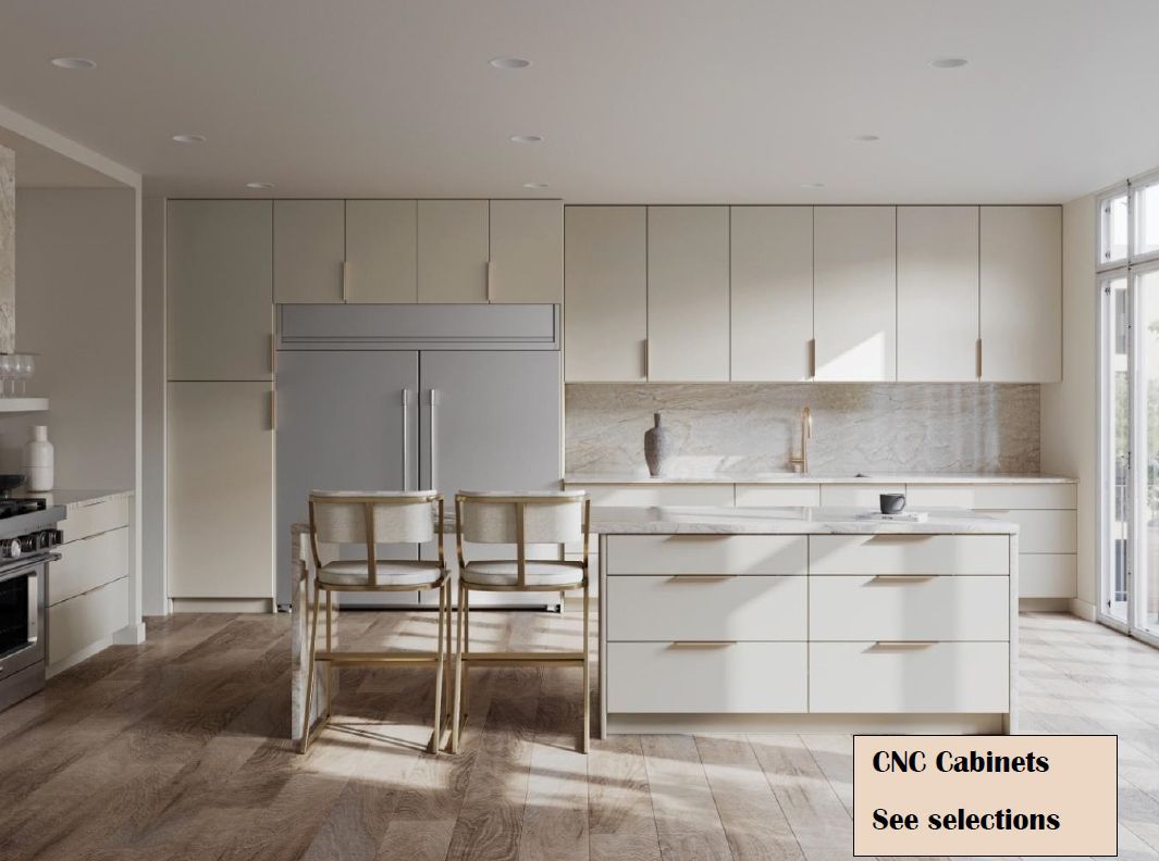 Modern kitchen with cream-colored cabinets, stainless steel fridge, island with seating, and large windows.