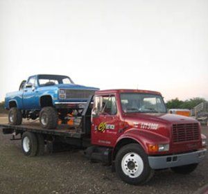 truck carrying a pick-up truck | CJ Service & Towing Inc | Kaneohe, HI