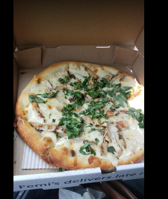 A pizza in a box that says fami 's delivers late