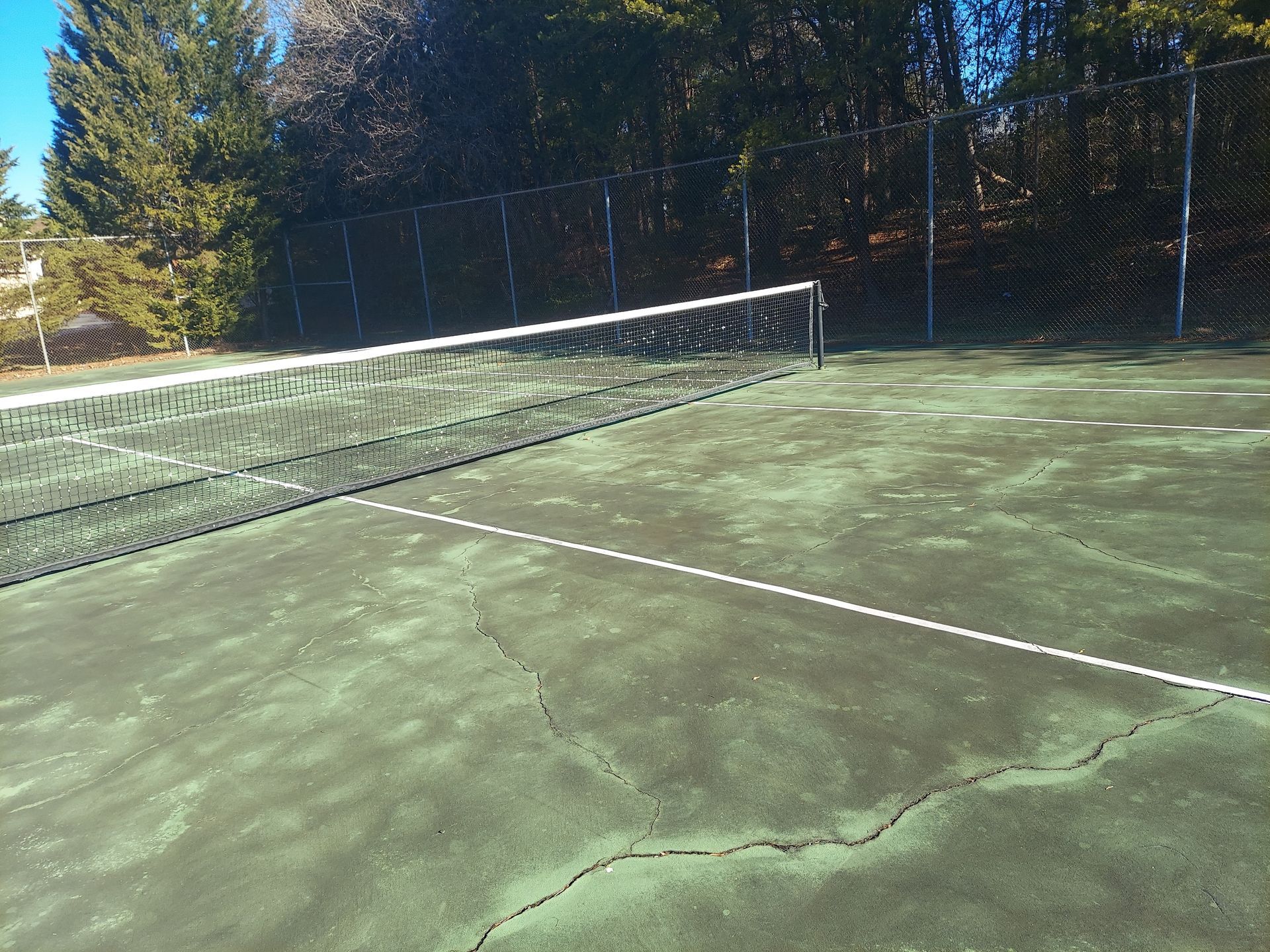 Tennis court with net before
