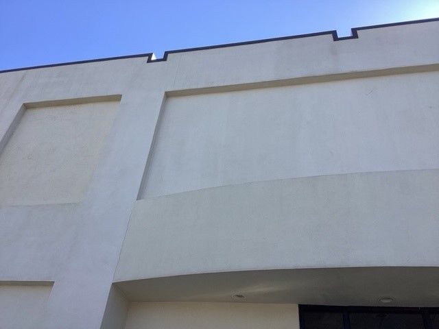 Commercial building wall - after pressure washing service