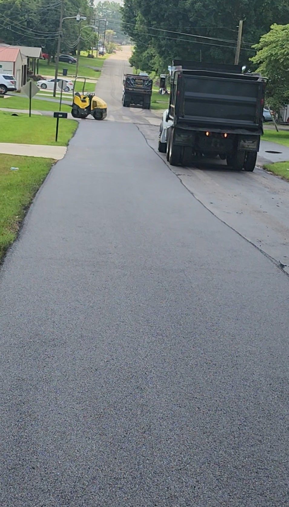 Road paving in progress on a street