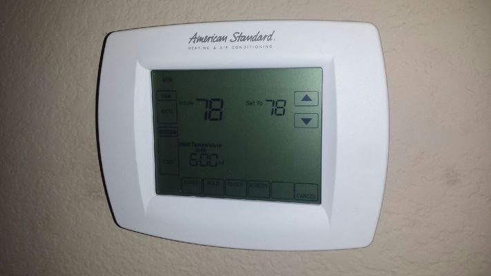 White American Standard thermostat displaying 78 degrees.