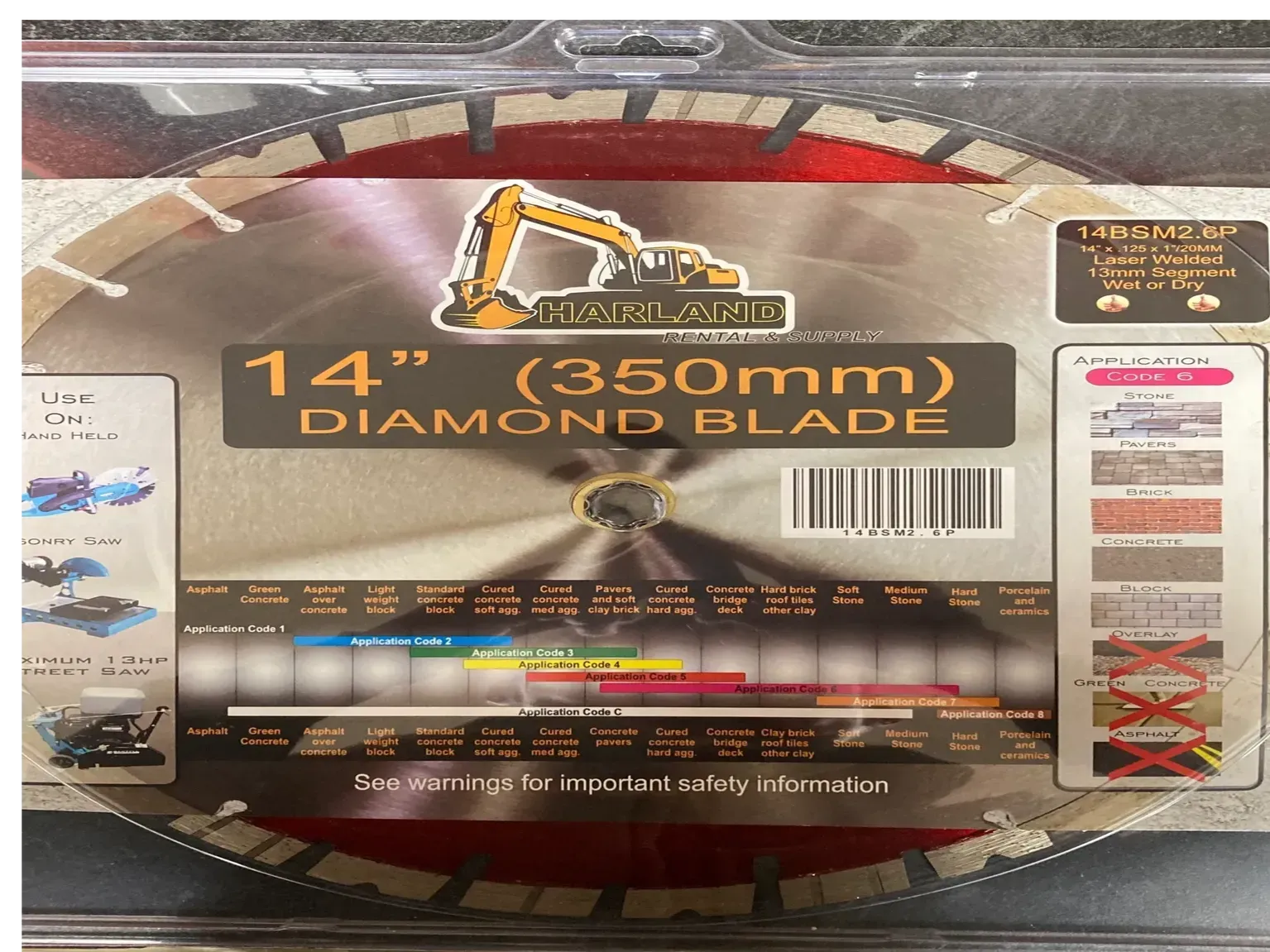 Diamond saw blade, 14 inches, with packaging and a diagram showing appropriate materials for use.
