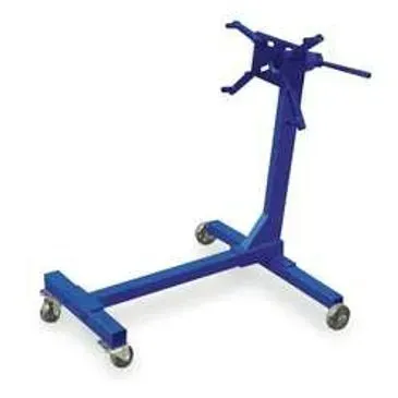 Blue engine stand on wheels.