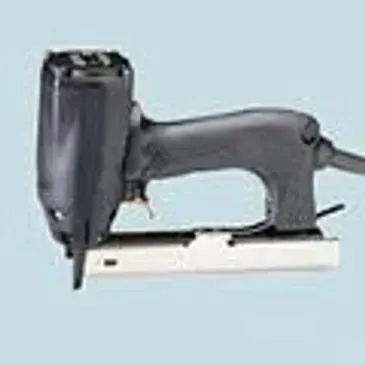 Black pneumatic staple gun on a white base.