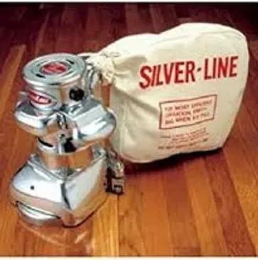 Shiny, chrome Silver-Line sander with bag on a wooden floor.