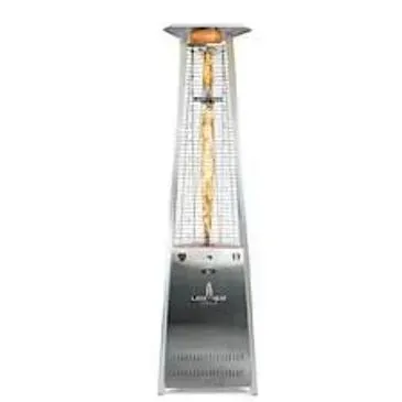 A tall, silver outdoor patio heater with a flame visible inside the glass tube.