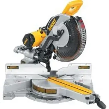 Yellow and silver DeWalt miter saw; blade covered, ready to cut wood.
