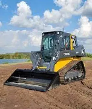 John Deere compact track loader on a dirt surface.