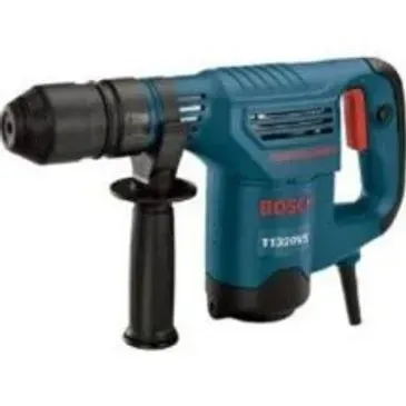 Blue and black Bosch rotary hammer drill with side and rear handles, isolated on white.