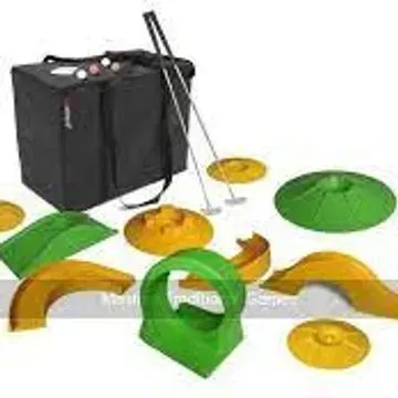 Miniature golf set: Black carrying bag, putters, various colored obstacles, and golf balls.