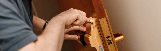 Man installing lock