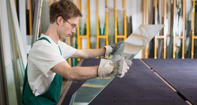 Glass inspection by worker