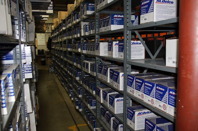 A warehouse filled with boxes of acdelco parts