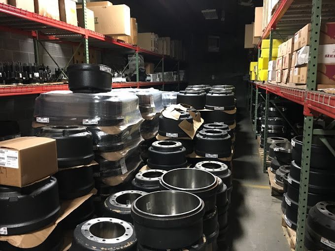 A warehouse filled with lots of wheels and boxes