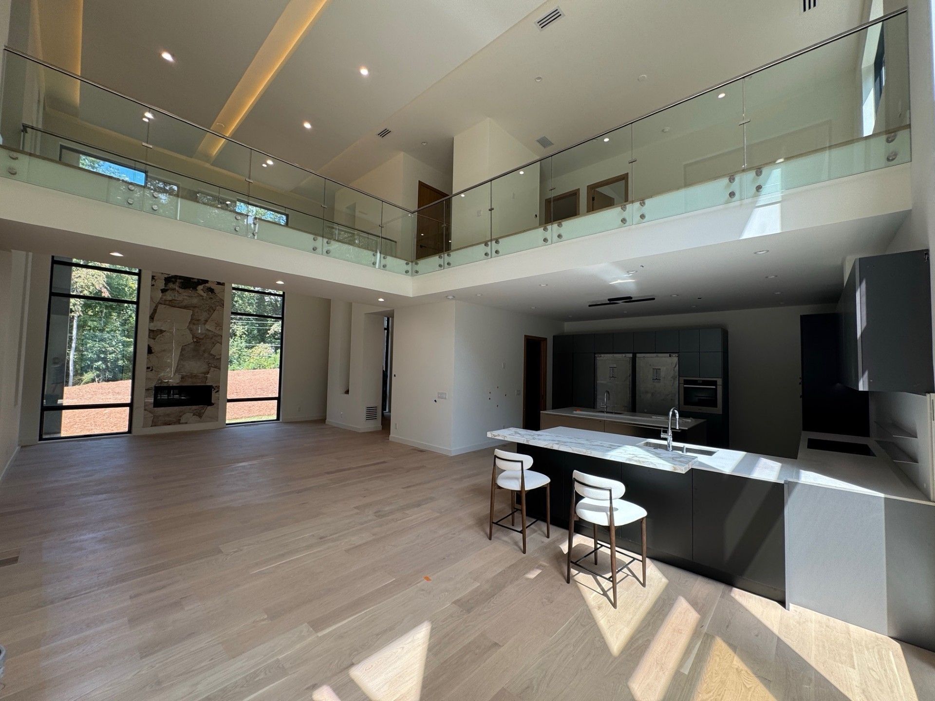 Spacious modern home interior with a mezzanine