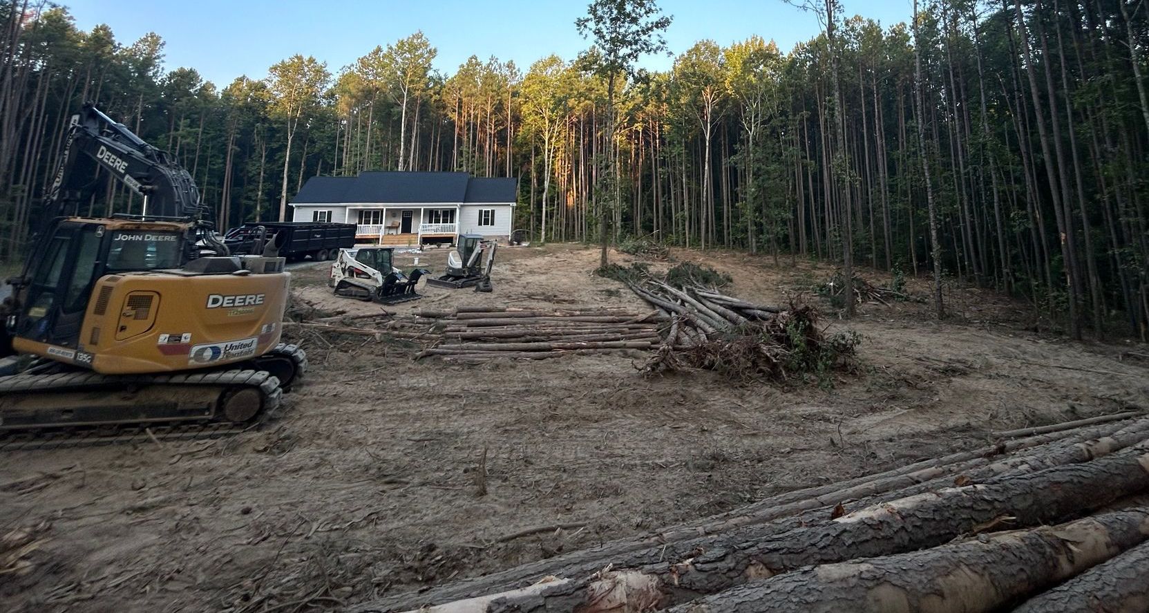 A house is being built in the middle of a forest.