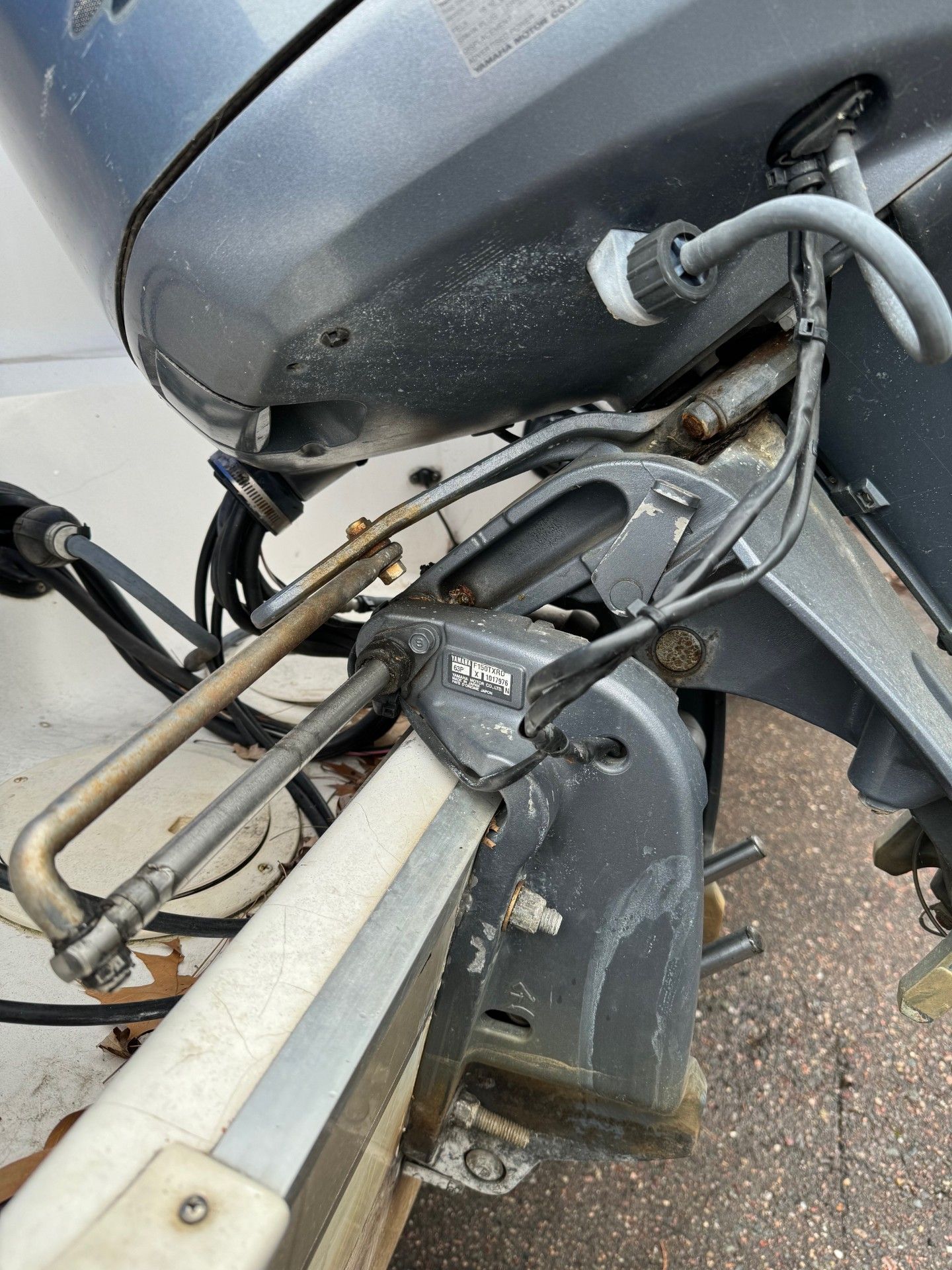 A close up of a yamaha outboard motor on a boat