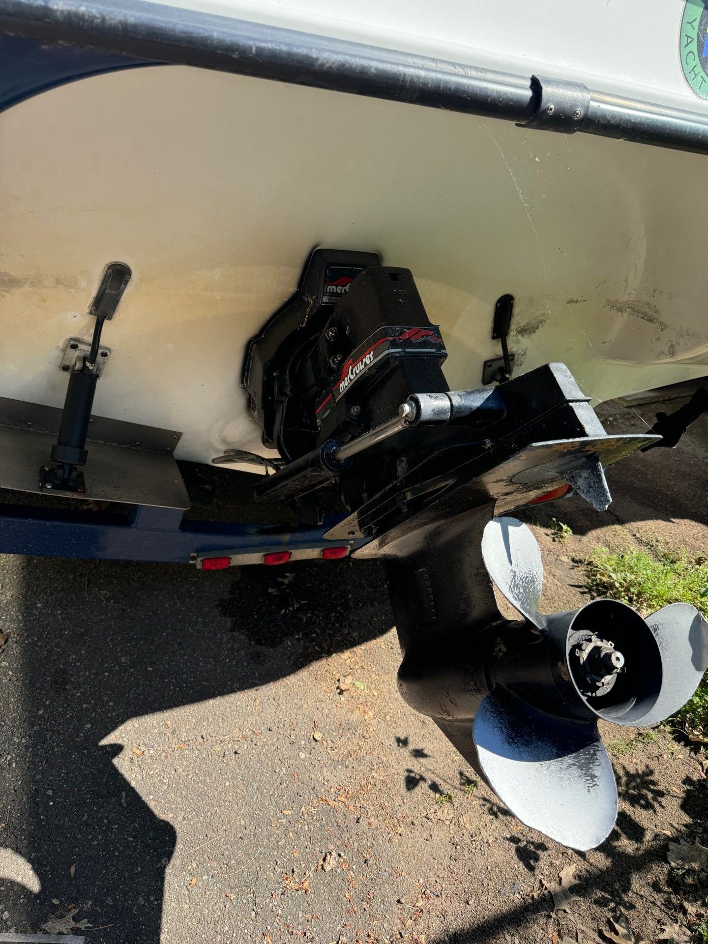 A boat with a propeller attached to it is parked