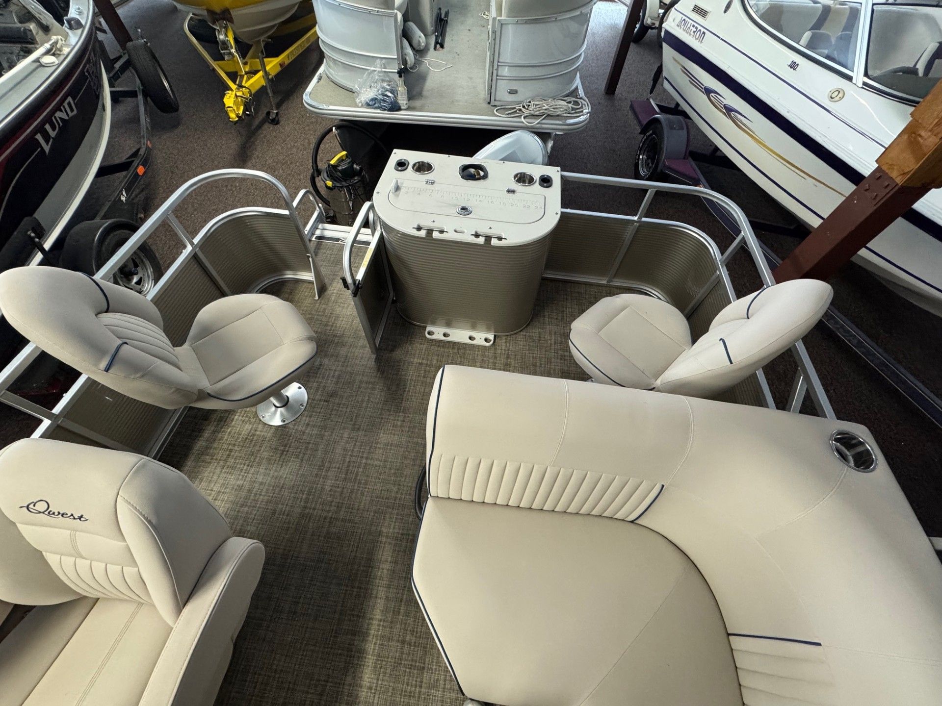 An aerial view of a pontoon boat in a marina