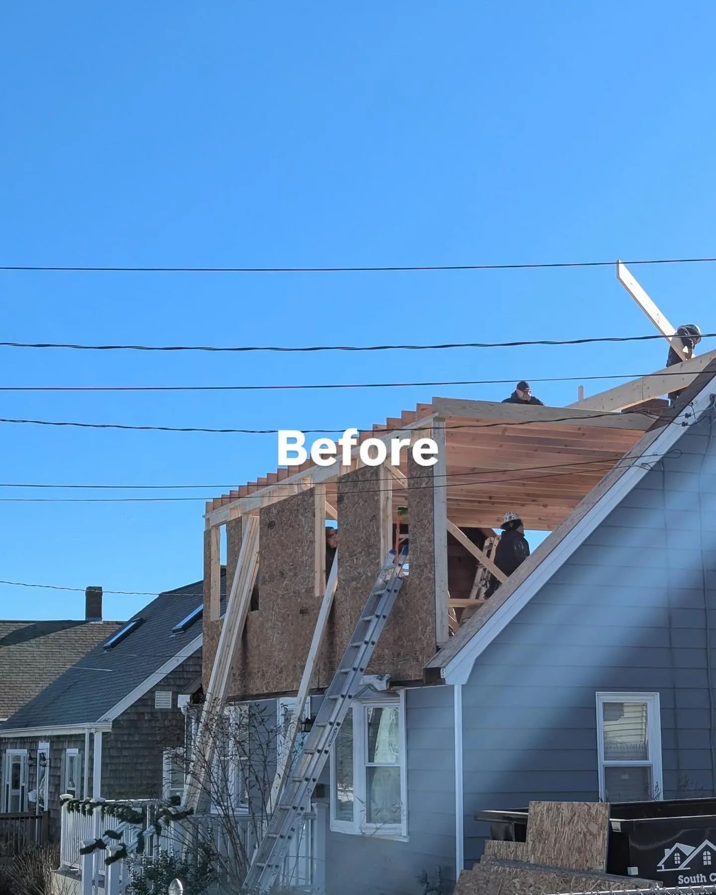 Roof under construction with exposed framing and plywood, labeled “Before,” on a blue house under a clear sky