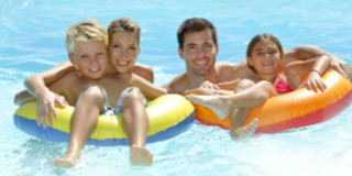Family enjoying in a pool