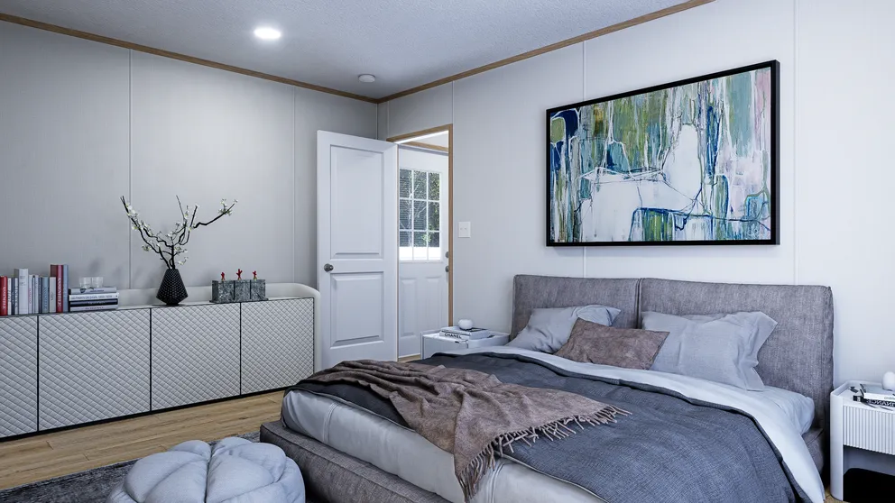 Bedroom with bed, abstract art, door to outside, and modern storage. Neutral colors and natural light.