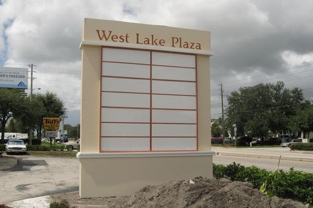 Sign for West Lake Plaza with blank panels for tenant names.