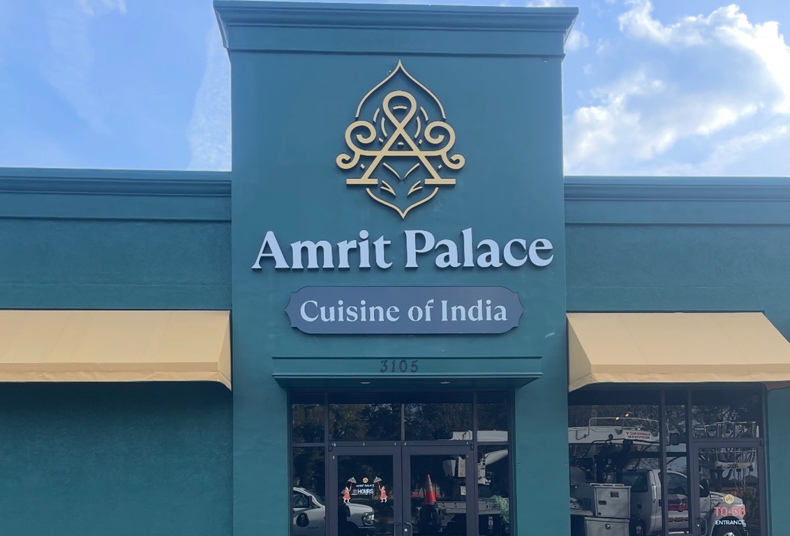 Amrit Palace sign