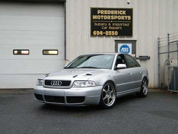 Car in front of the shop
