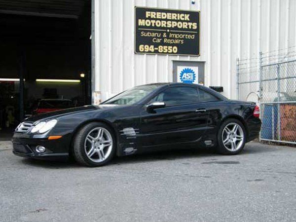 Car in front of the shop