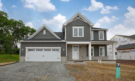 Beautiful home with a sold signage