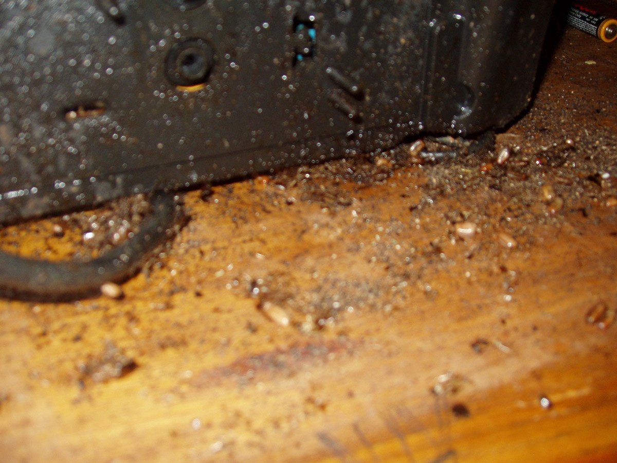 A kitchen with a tiled floor and a stove