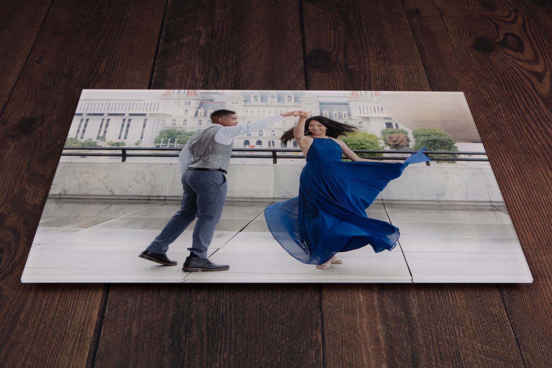 Acrylic print of a couple dancing outdoors.