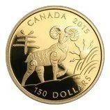 Canadian 2015 $150 coin with a mountain goat and tree design, gold-toned close-up