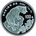 Commemorative silver coin with a bear and the number 100, engraved with Chinese text