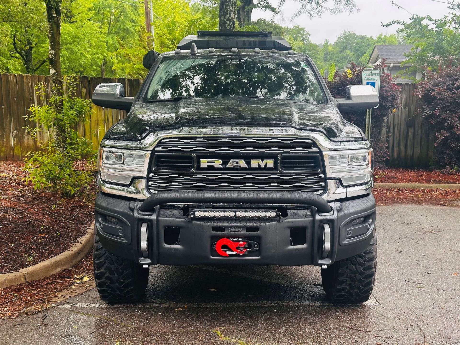 The front view of a black 2019 RAM 2500 truck with an AEV Front Bumper and Winch that is owned by Brett Madison.