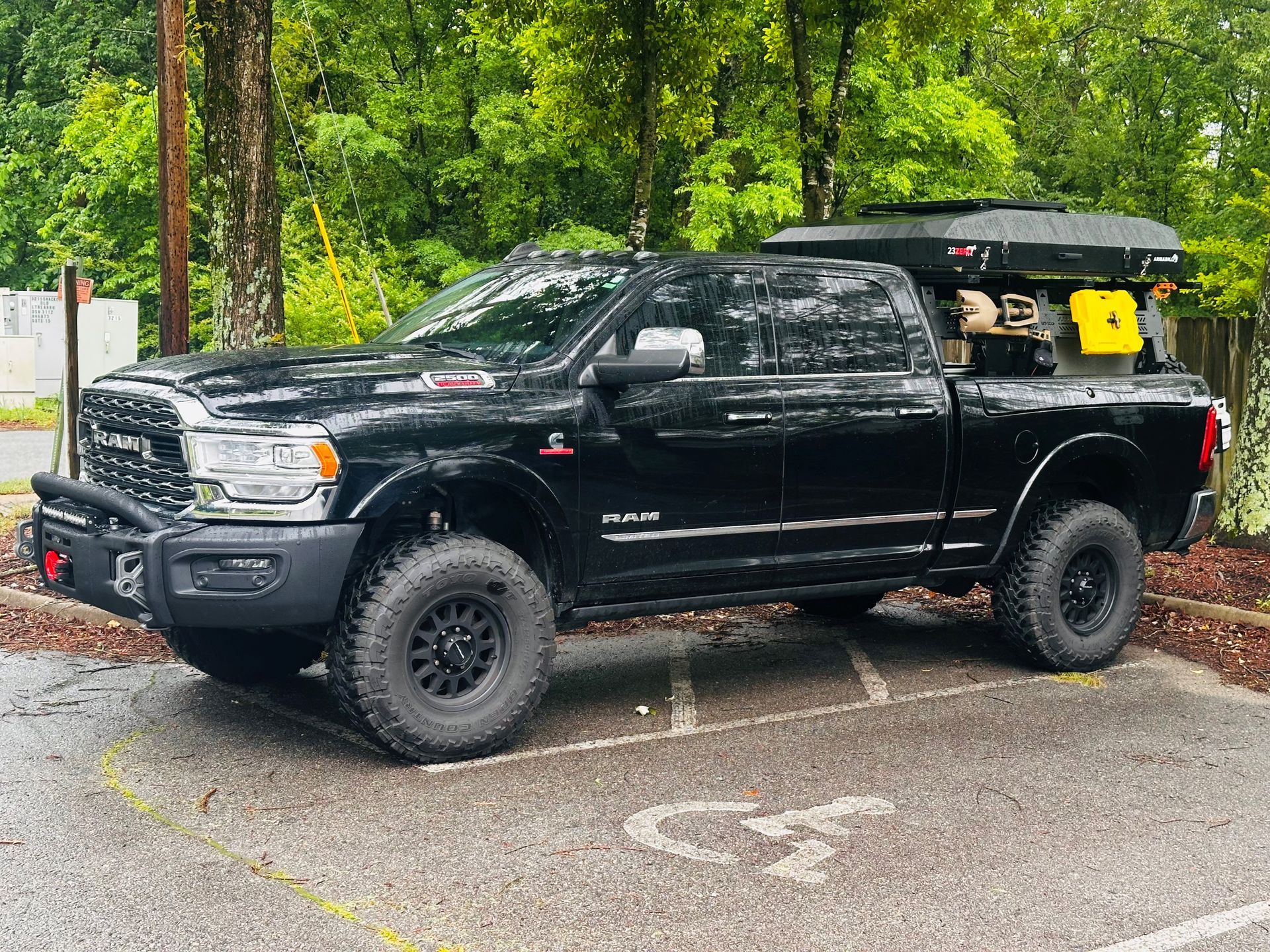 The side view of a black 2019 RAM 2500 truck with an AEV Front Bumper and Winch that is owned by Brett Madison.