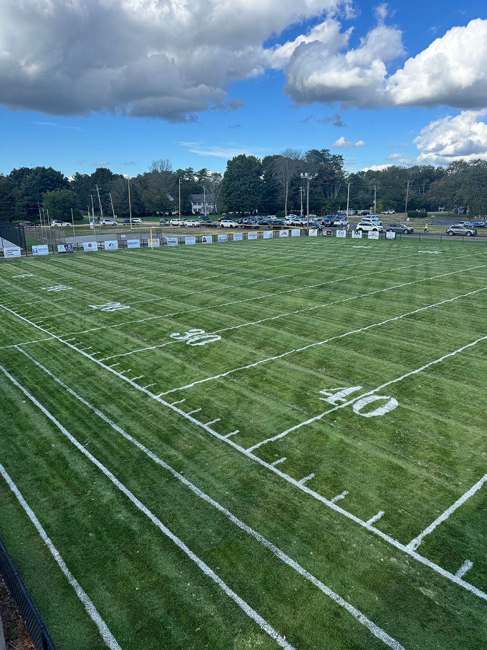 Football field with white yard lines