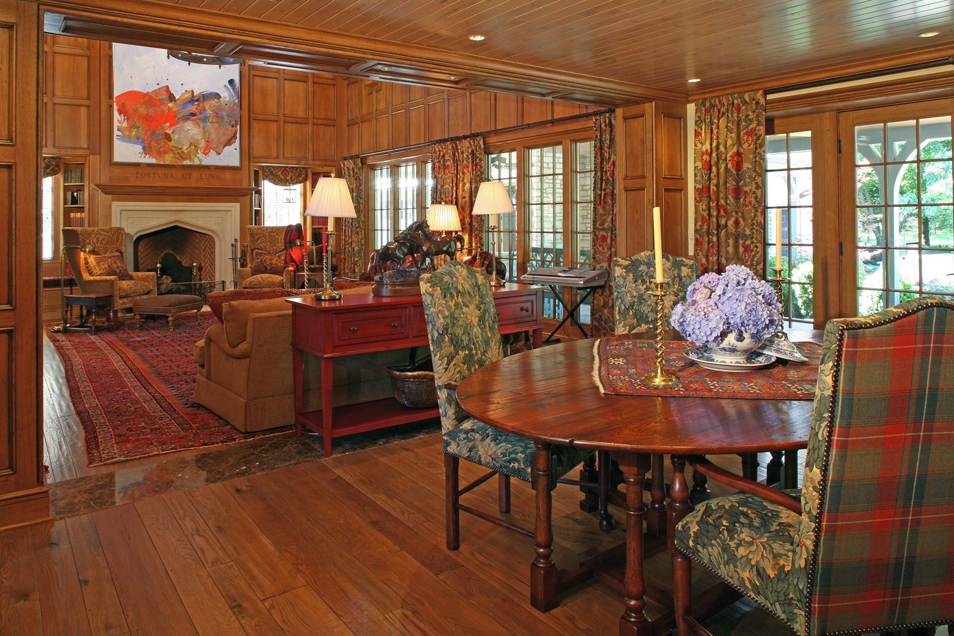 Custom wood paneled living and dining room