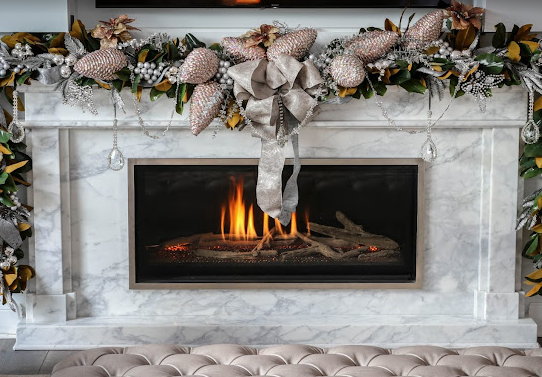 A fireplace with a mantle decorated for christmas