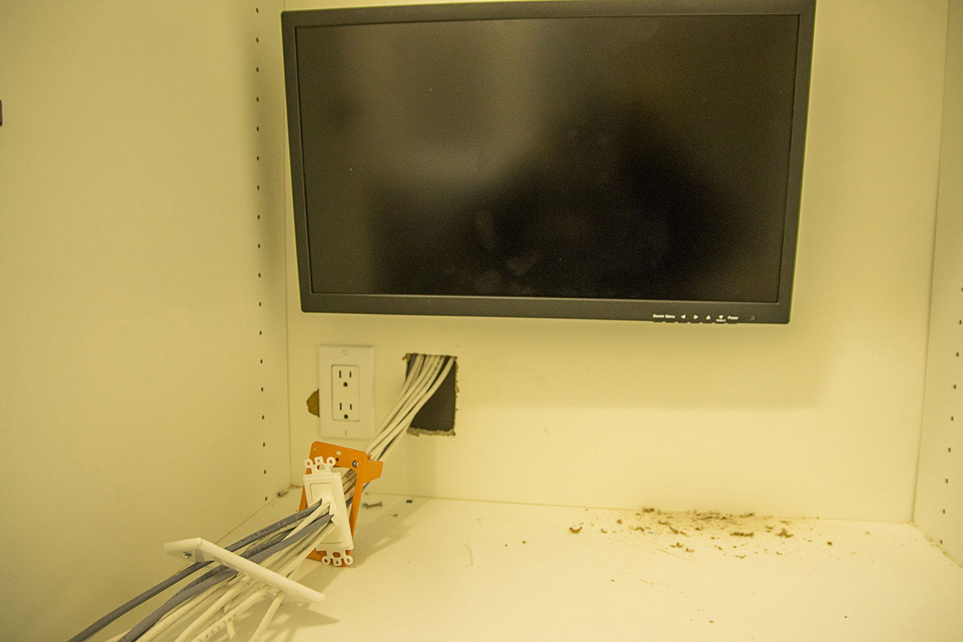 small TV with wire organizer