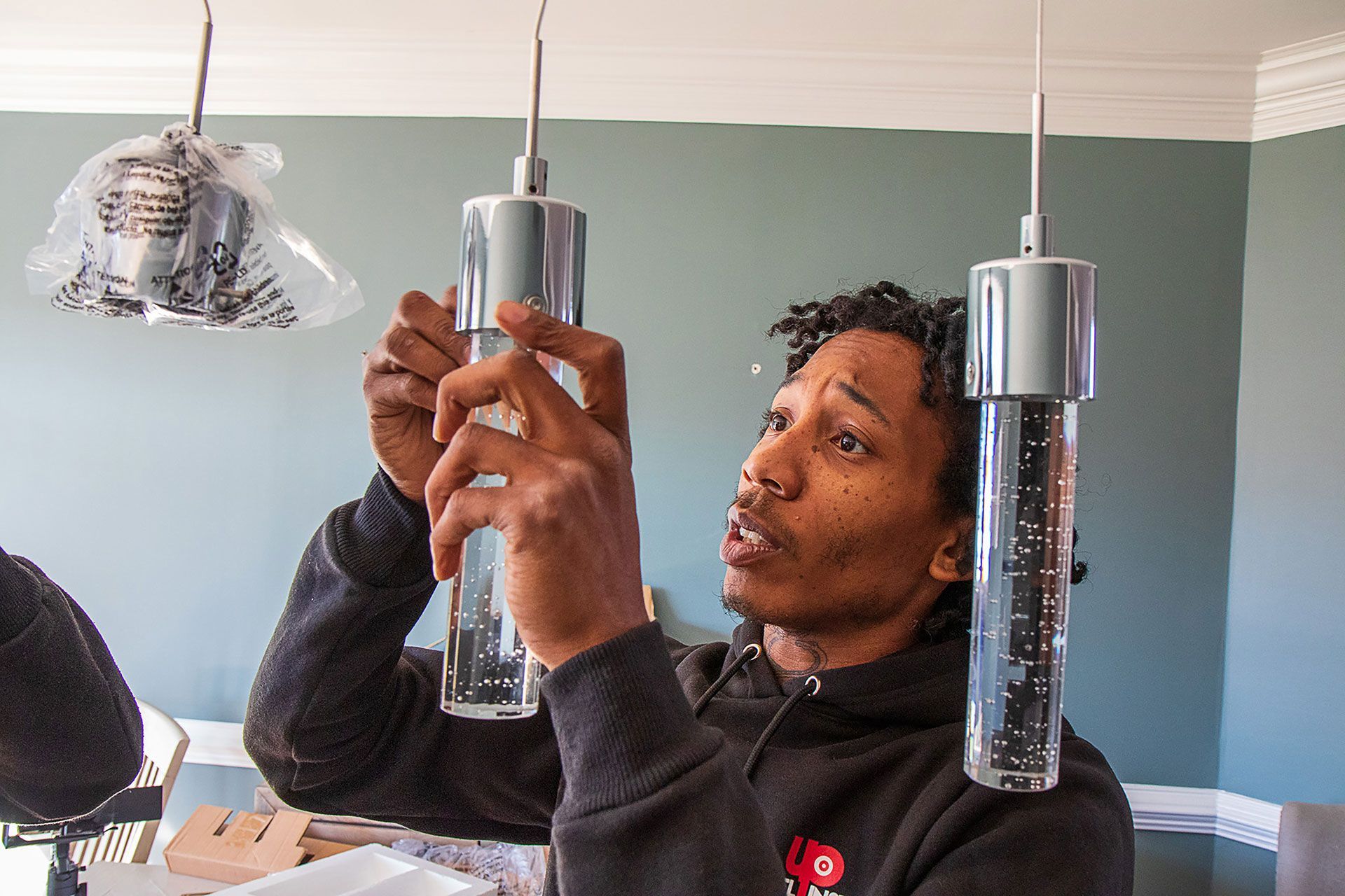 man installing the bulbs