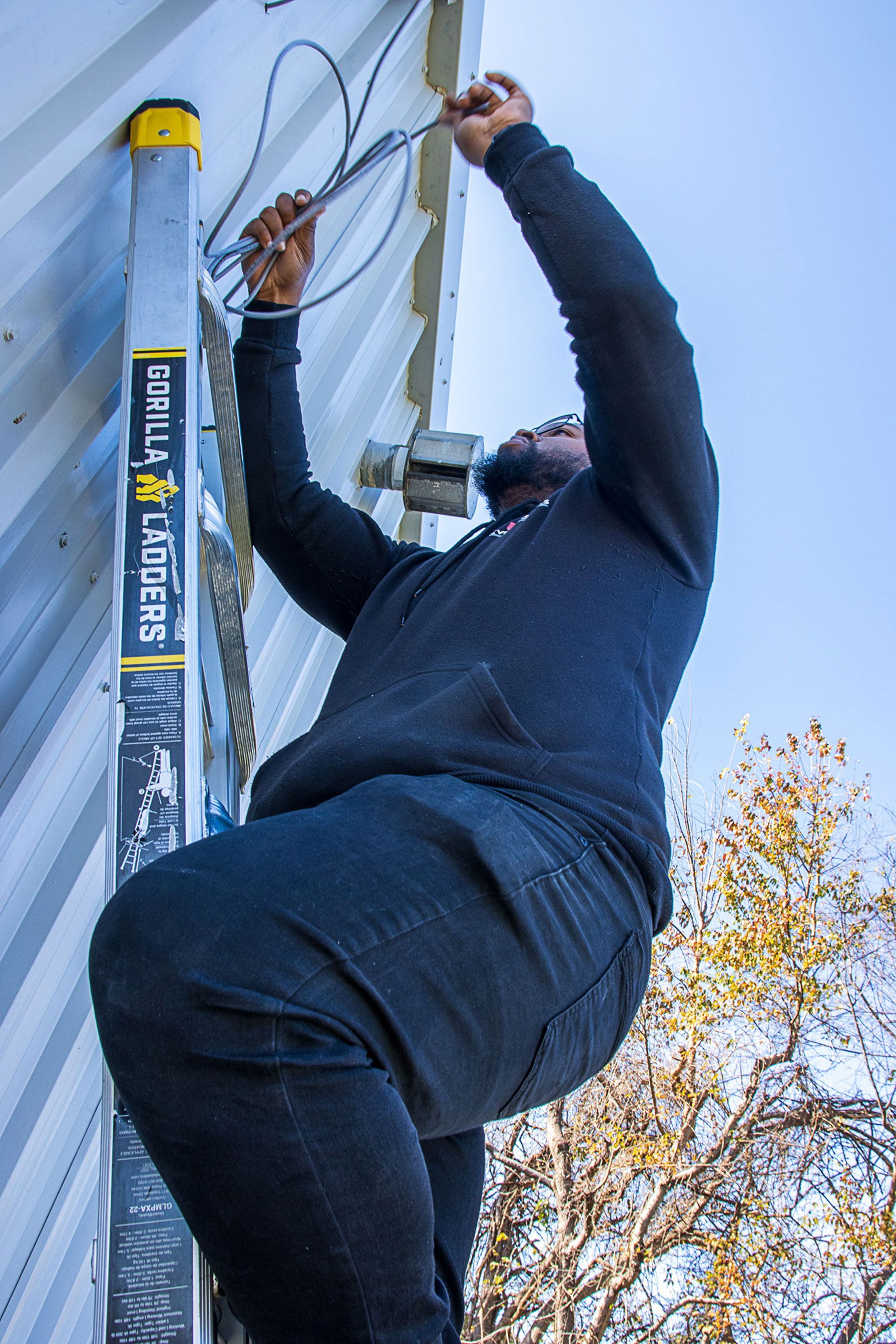 man arranging the wiring