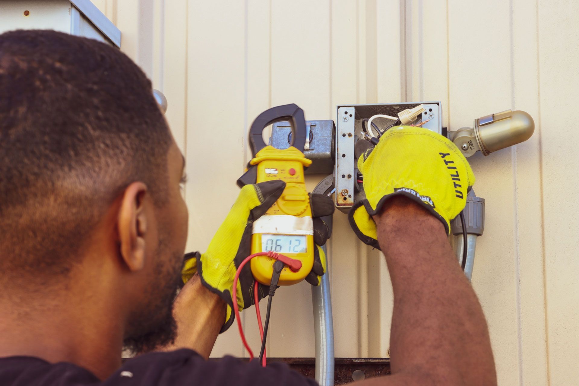 man testing the wiring
