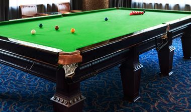 Green felt pool table