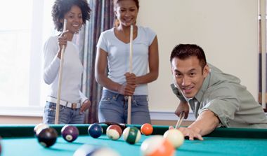Group of people playing pool