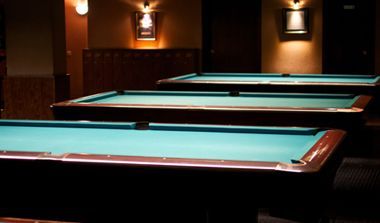 Pool tables in a pool hall